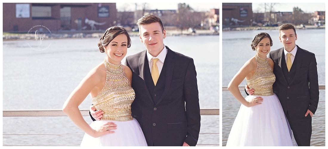 couple going to prom posing for pictures on boardwalk citydeck in downtown green bay wisconsin de pere prom